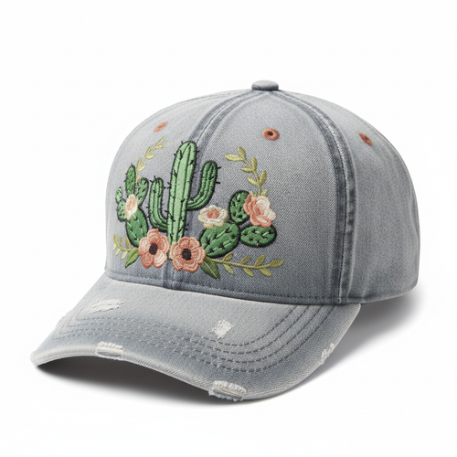 Distressed denim snapback with embroidered cactus and floral design and rose gold eyelets